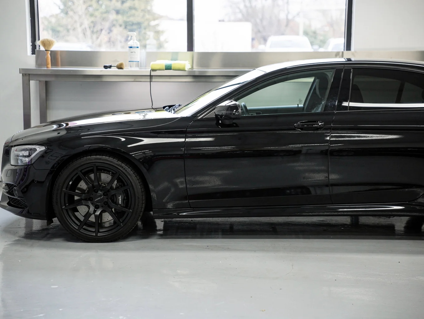 Completed vehicle with clean reflective paint finish