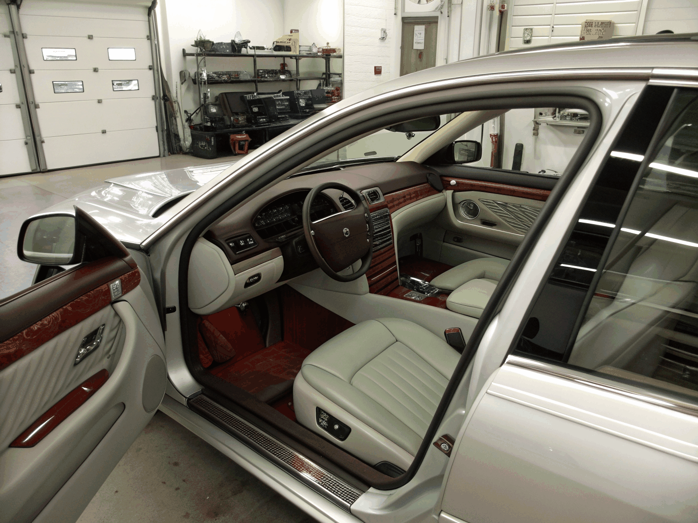 Spotless vehicle cabin leather seating and clean dashboard surfaces